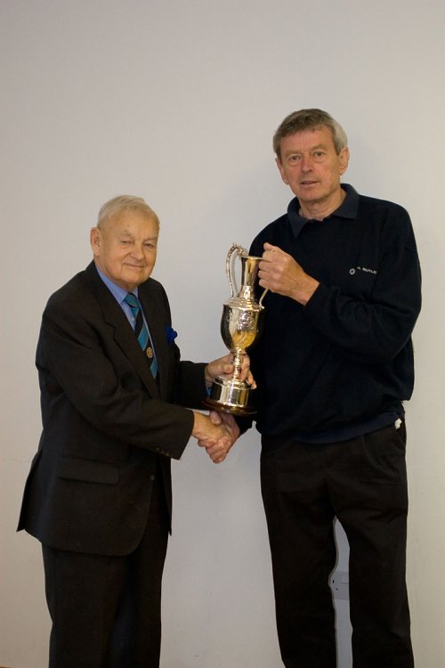 Hardwicke secretary Stan Hine receiving the Les James League Cup from Vice-President John Crowther