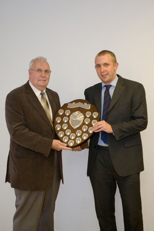 Rob Cockle receiving the Tony Neather Shielf from GFA Referees Committee Chairman Alan Pearce