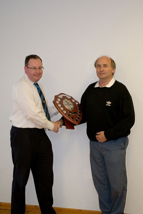 Kings Stanley secretary Roger Bassett receiving the Ron Jay Shield from Registration Secretary Nigel Meaney