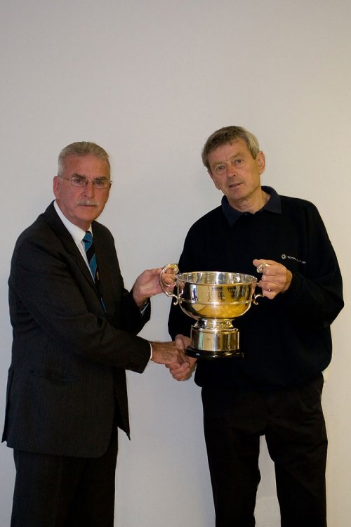 Hardwicke secretary Stan Hine receiving the League Championship Trophy from Chairman Robin Stewart