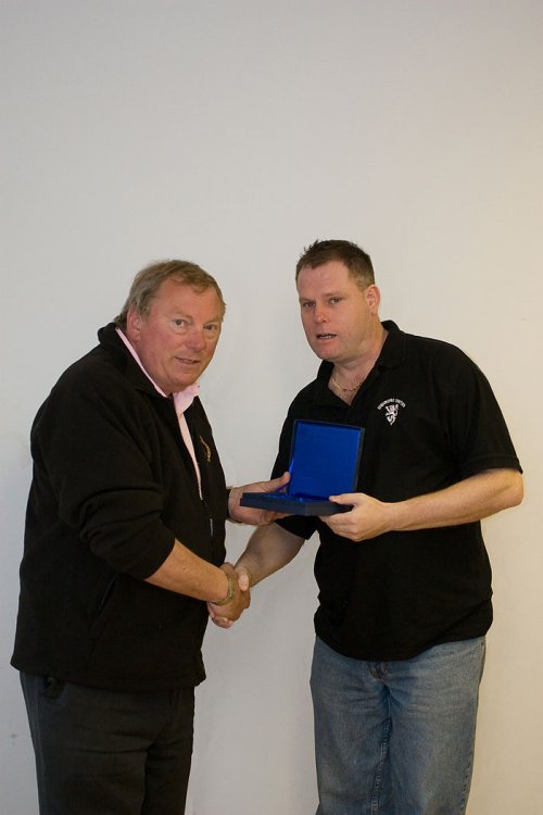 Highridge United secretary Lee Watts receiving the League Runners-up award from Vice-Chairman Peter Langley