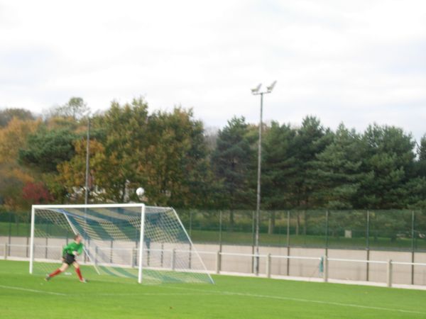 Axa Keeper Dave Rice watching the ball hit his Crossbar