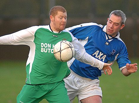 Battling for the ball. AXA Vs Pucklechurch