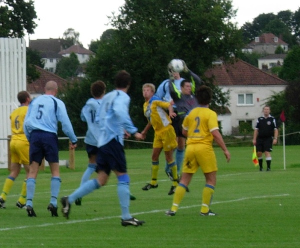 Steve Benbow claims the ball