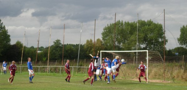 Tom Burridge with a volley for Taverners against DRG Stapleton