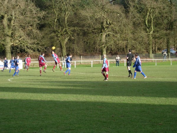 Patterson gets his head to the ball