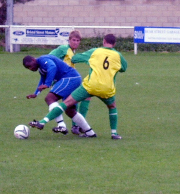 Marvyn Roberts forces his way throgh the gap